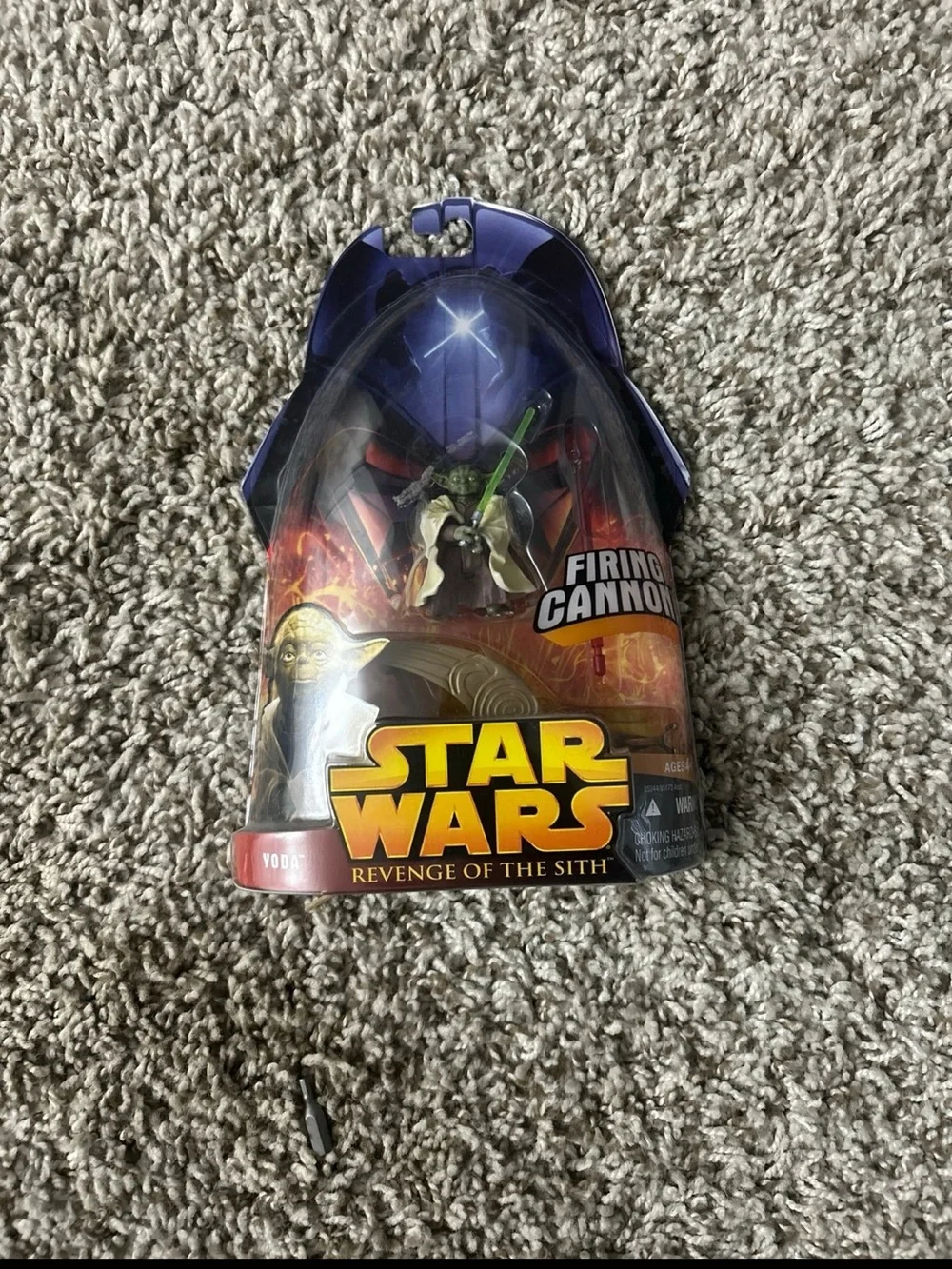 Star Wars Yoda Figure with Green Lightsaber and Purple Blister Pack